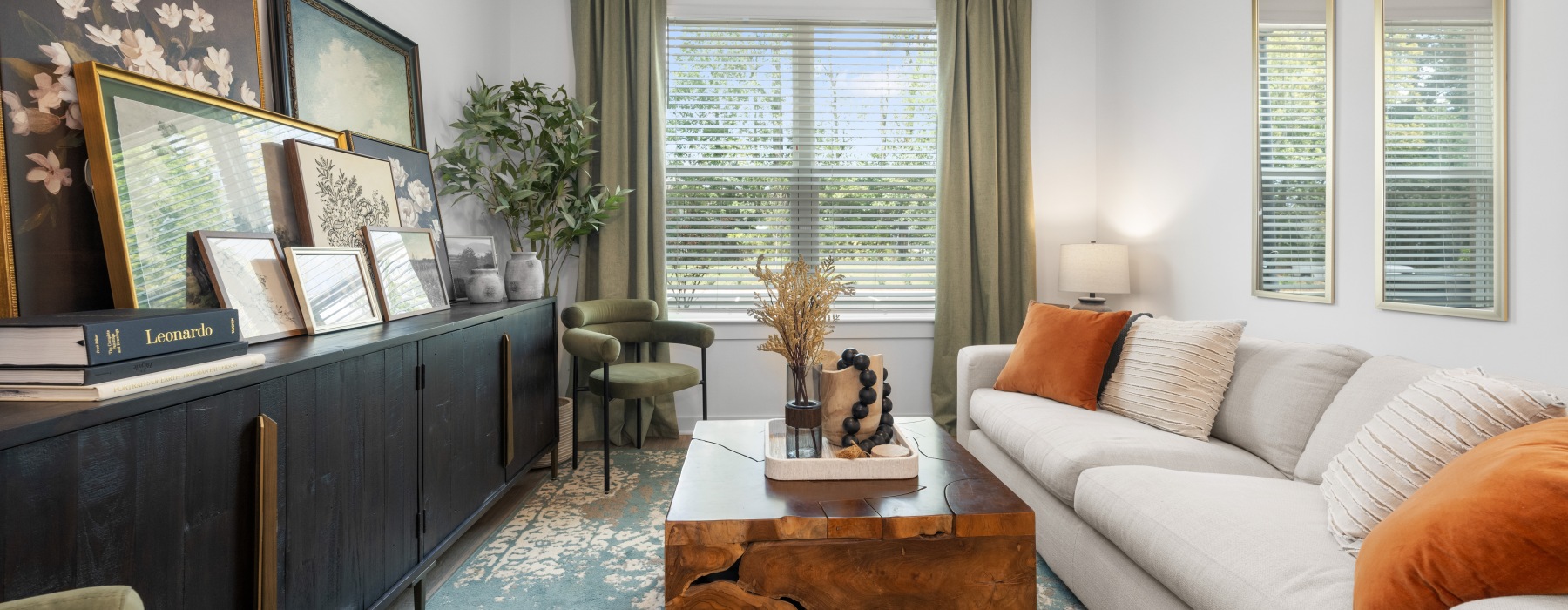 Living room with modern decor and large window